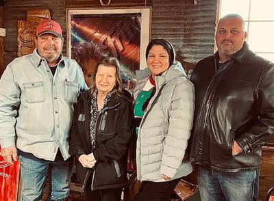 Former owners Allen & Sandra Berry (left) with new owners Brian & Erika Kuehn (right)