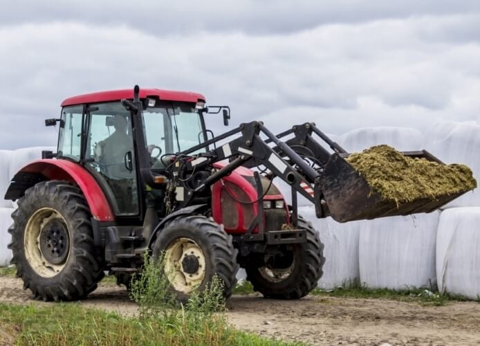 Tractor with Hay Fork Attachment
