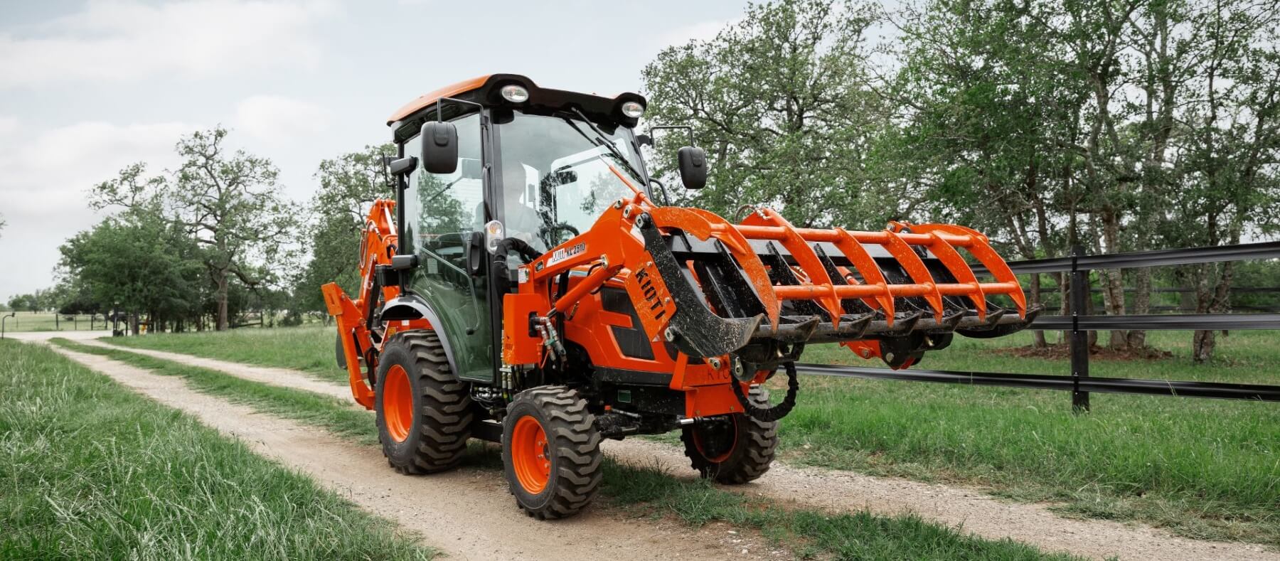 Kioti Mid-HP Tractor with Skeleton Bucket